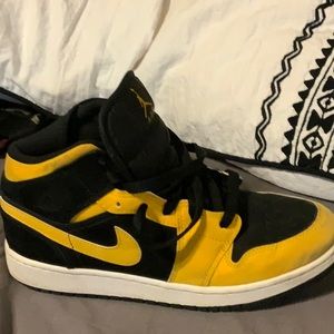 Black and yellow Jordan’s
